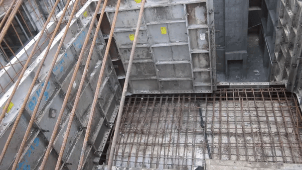 How is plumbing and electrical work integrated into buildings using pre