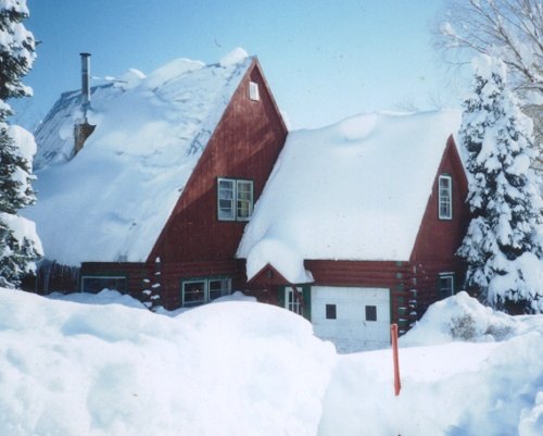 Why are some homes designed with slanted rooftops and some with flat