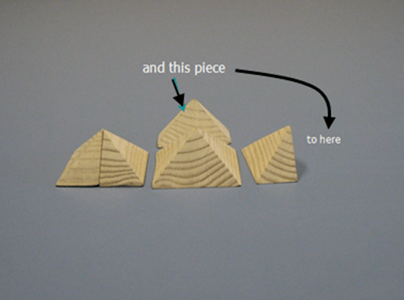 How many pyramids touching two corners of a cube can fit inside of it