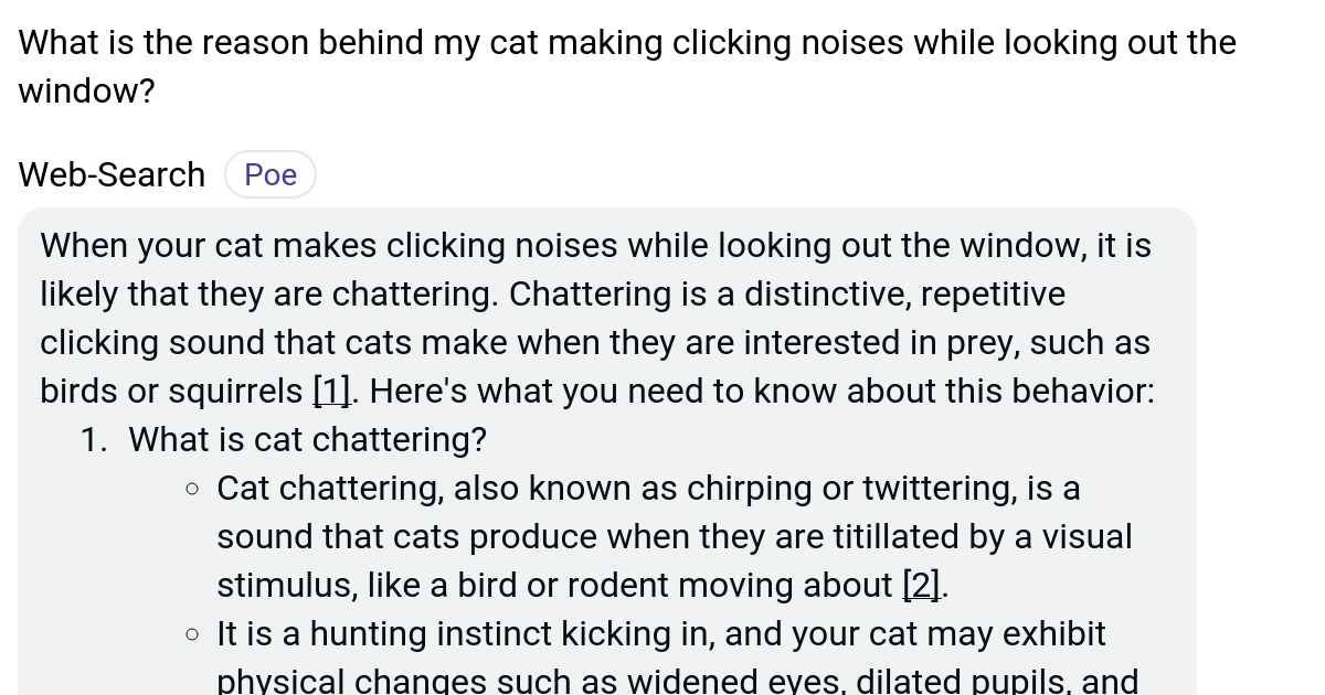 What is the reason behind my cat making clicking noises while looking