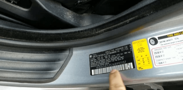 Where is the VIN number on a car located other than inside the