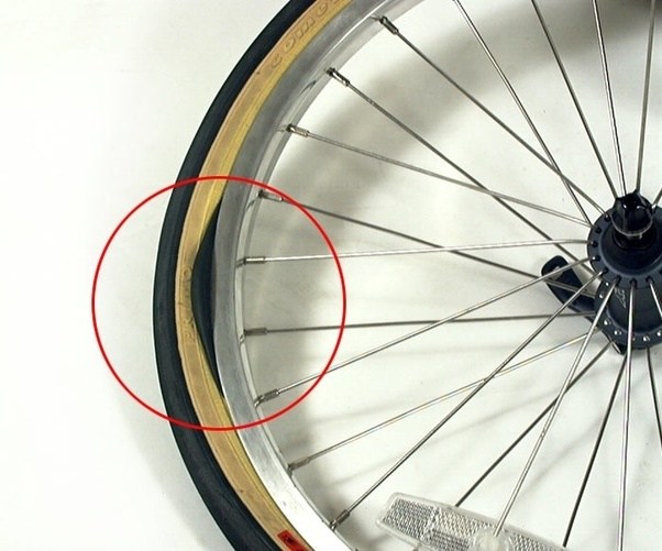What caused my bike tire to lump then explode while riding my bike? Quora