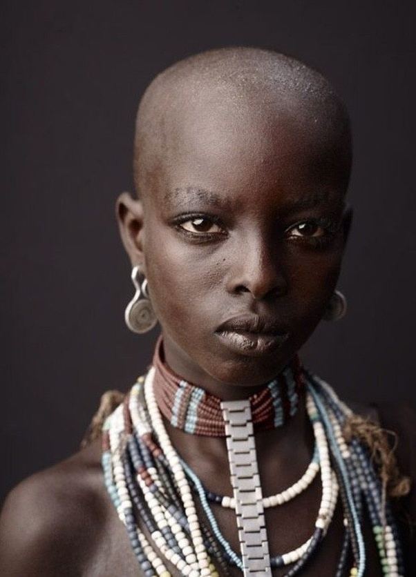 Why would a woman shave her head? Quora