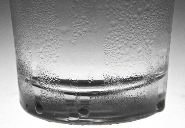 Why does water drop out from the air conditioner when it's on? From