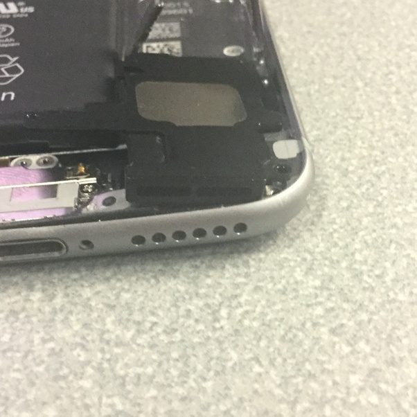 How to get the dirt and dust out of the speaker holes of my iPhone 6