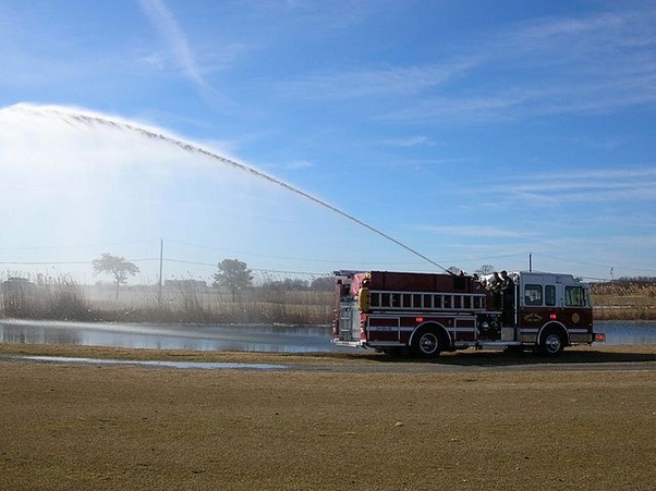 How much water do fire trucks carry and how long will the water last if