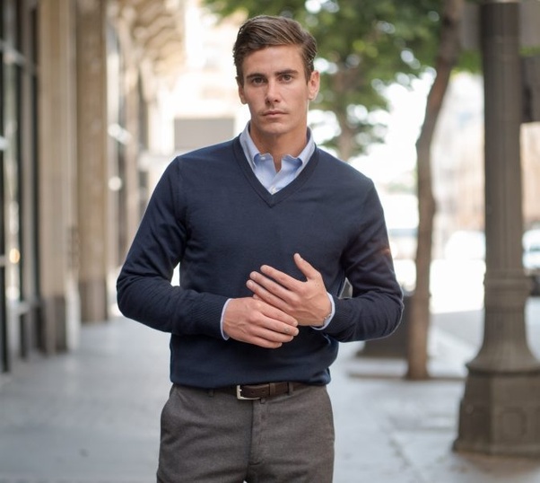 Should shirt collars be tucked into a sweater or sticking out? Quora