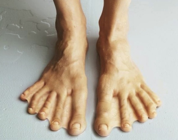 Why do babies have webbed feet and hands when in the