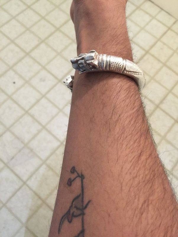 Why do many Indian men (other than Sikh) wear a kada (a steel bangle