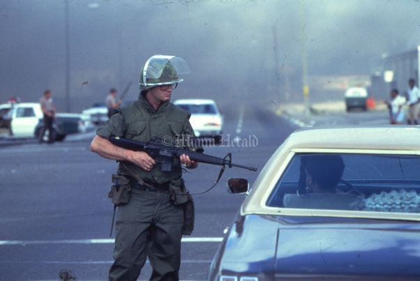 Why do law enforcement personnel wear their Kevlar (bullet proof vest) inside of their uniform