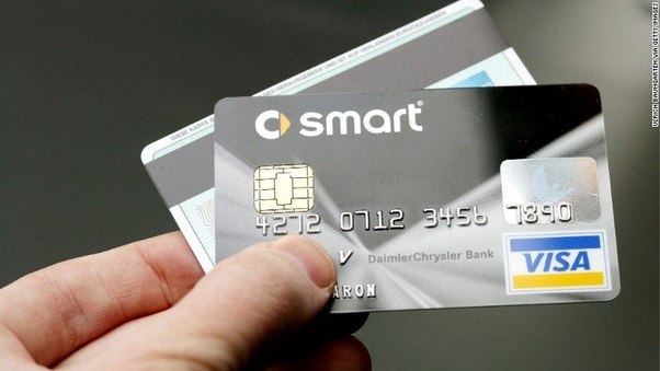 Why do credit cards with a smart chip still have a strip on