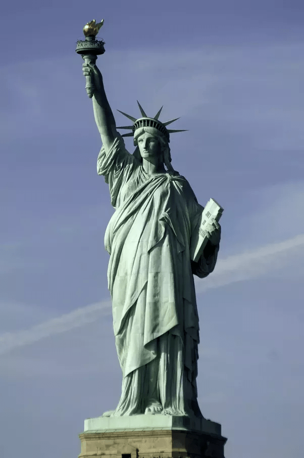 What was the original color of The Statue of Liberty? What made the