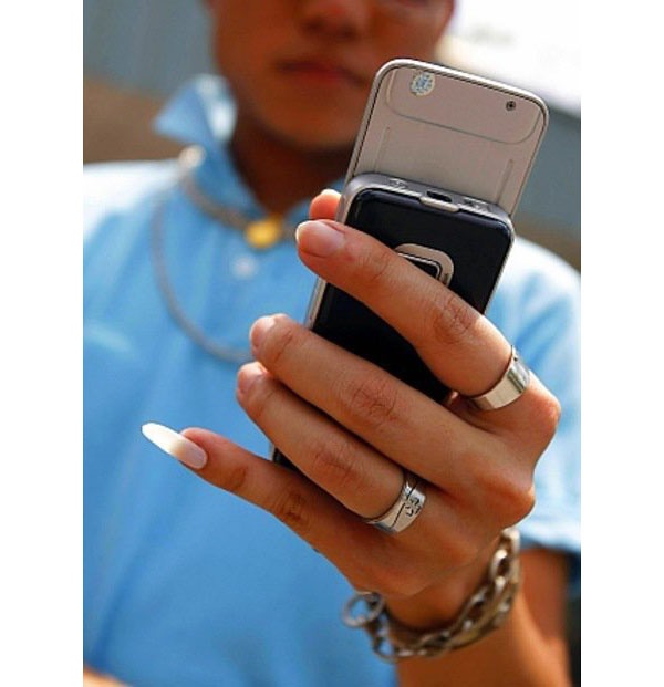 Why do some people, usually men, have a very long pinky little