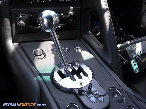 While driving, can I half clutch to slow down a running car? Quora