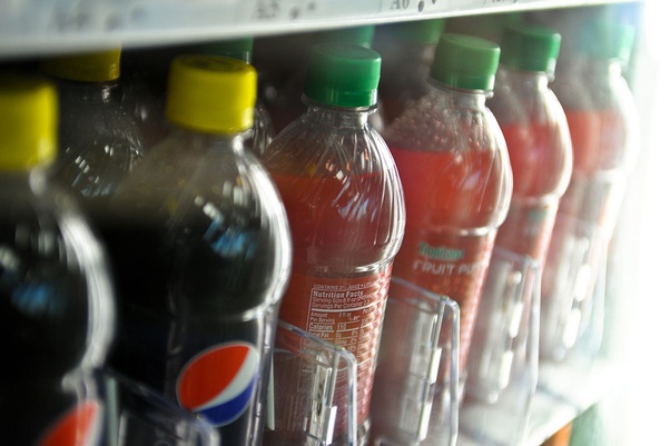 Do carbonated beverages such as Coke affect muscle gain while working