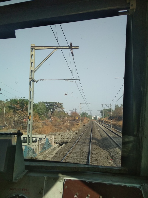 What does OHE Pole mean in railways? Quora
