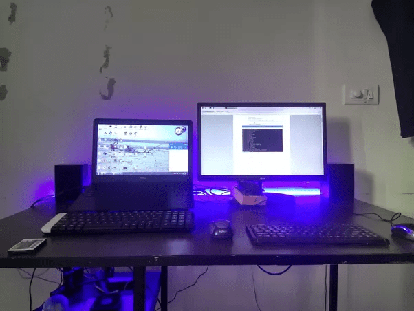 Can you share pictures of a 24 inch monitor placed near a 15.6 inch