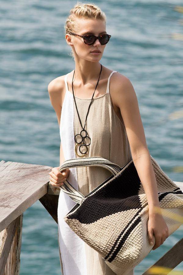 What does 'beach chic' mean for a dress code when attending a wedding? What are some tips to