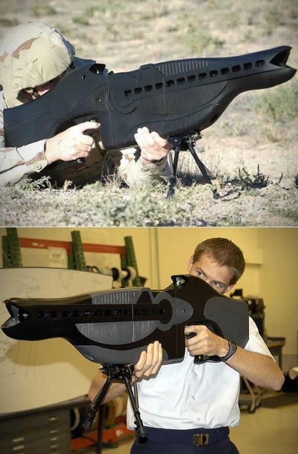 What are some futuristic weapons or technologies currently in service