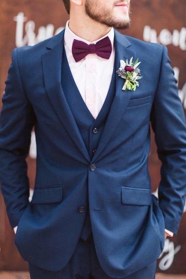 What will be best colour combination for a groom's suit when the bride is wearing a maroon gown