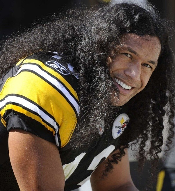 Why do football players like to have long hair? Quora