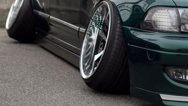 How do tilted wheels and tires work on a modified car? Quora