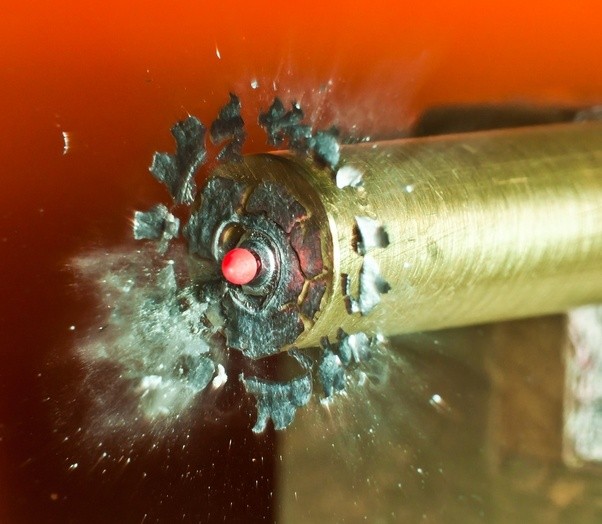 A bullet loses 1/20 of its velocity after a