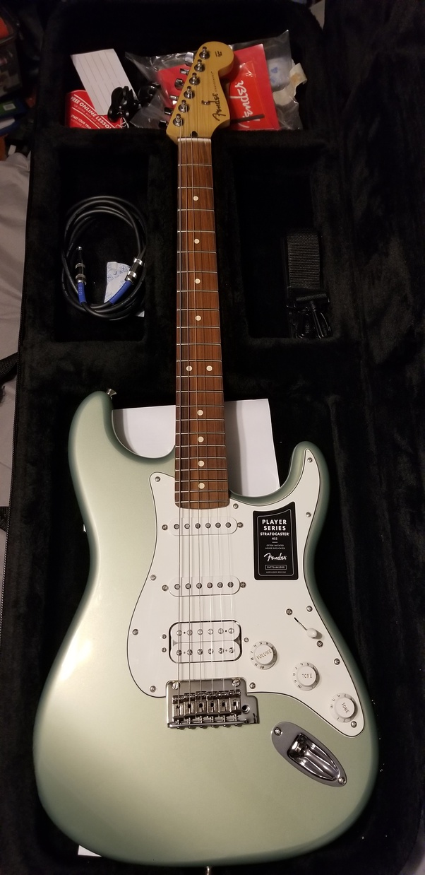 What is the best 700 electric guitar for a beginner that's relatively customizable? Quora