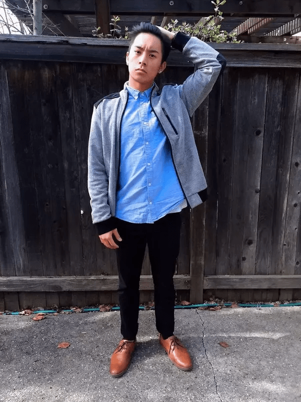 What color collared shirt should I wear with black pants and brown