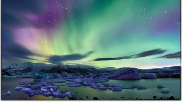 What is the best country to travel to in December to see the northern
