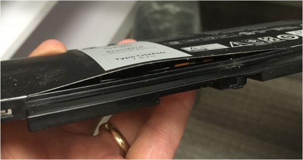 Is it safe to use a laptop with a swollen battery? Quora