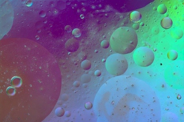 Why does oil float on water? Quora