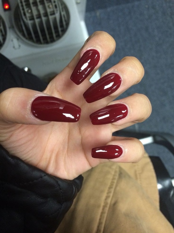 Do you have any pictures of yourself with long red acrylic nails? How