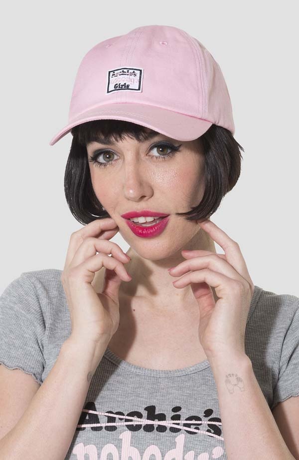 Why do some young women like to wear a cap? Isn�t wearing