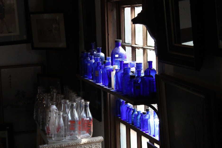 Poem Blue Bottles in The Light Quarry House