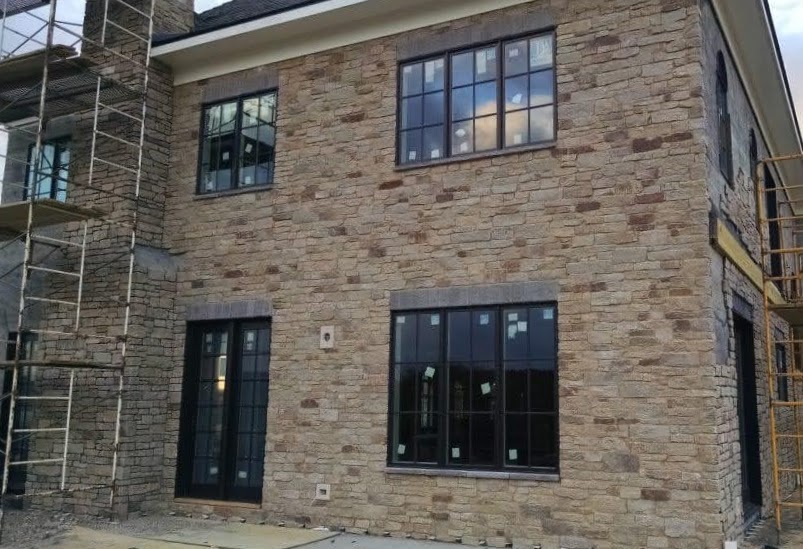 Calgary Real Stone Veneer Exterior Installation in Progress Natural