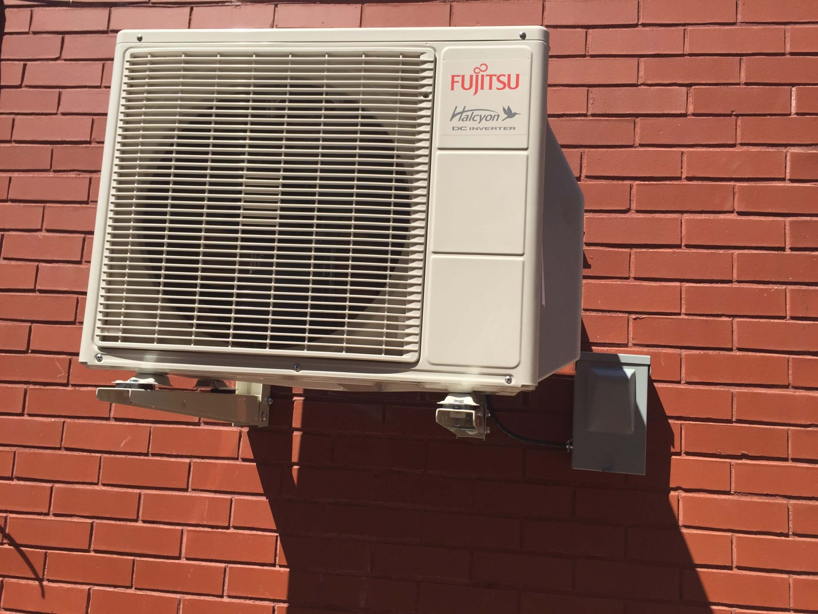 Before and AfterOutside view of installation Queens Ductless Air