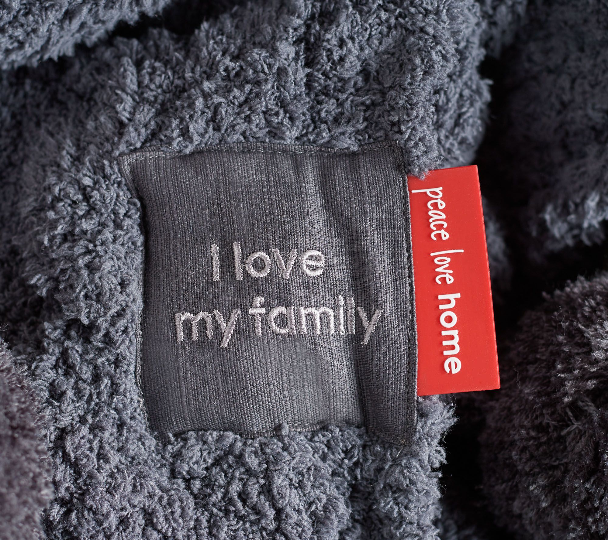 Peace Love World 60" x 70" Plush Cable Knit Throw with PomPoms