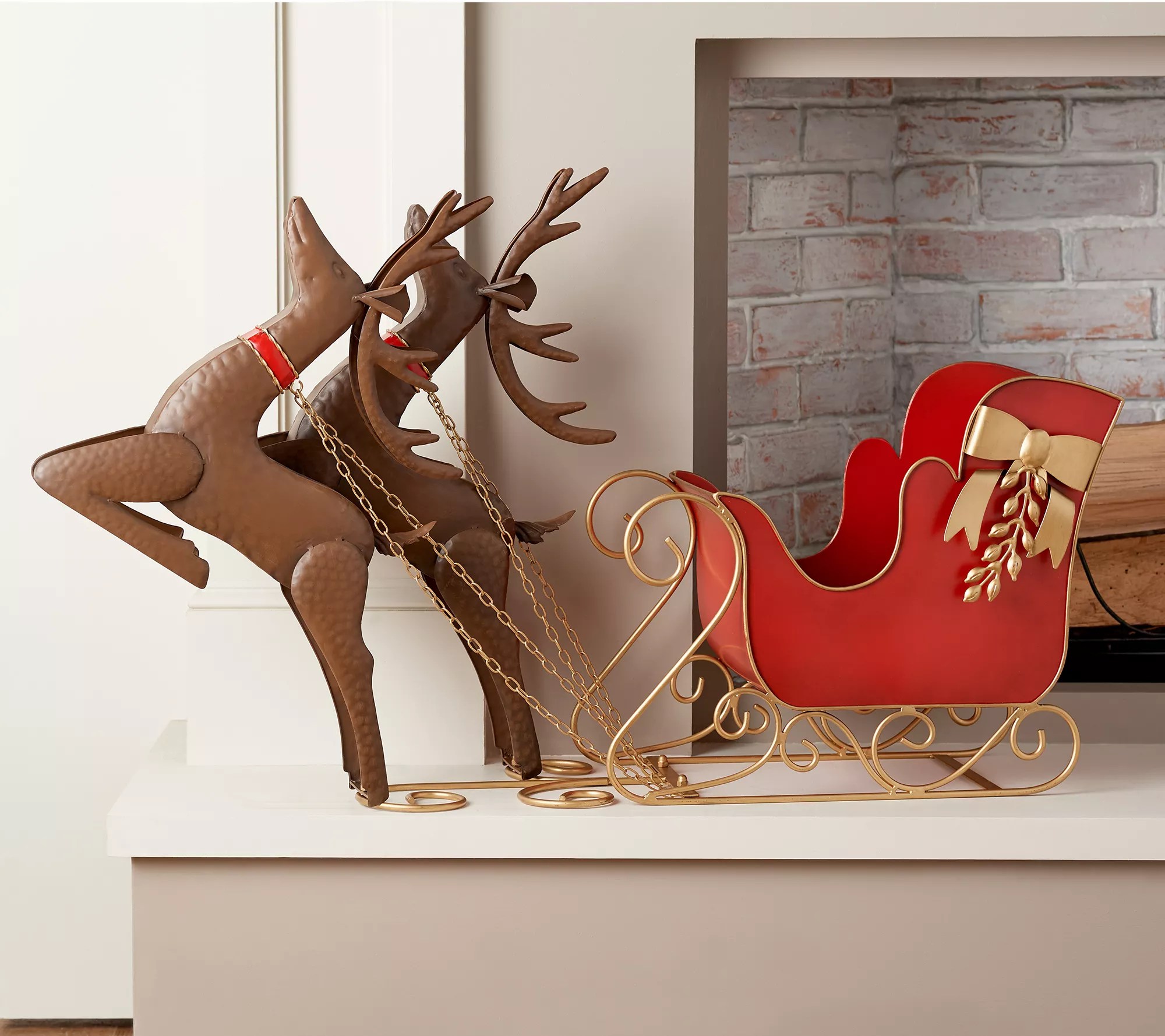 Oversized Metal Sleigh with Reindeer in Flight by Valerie