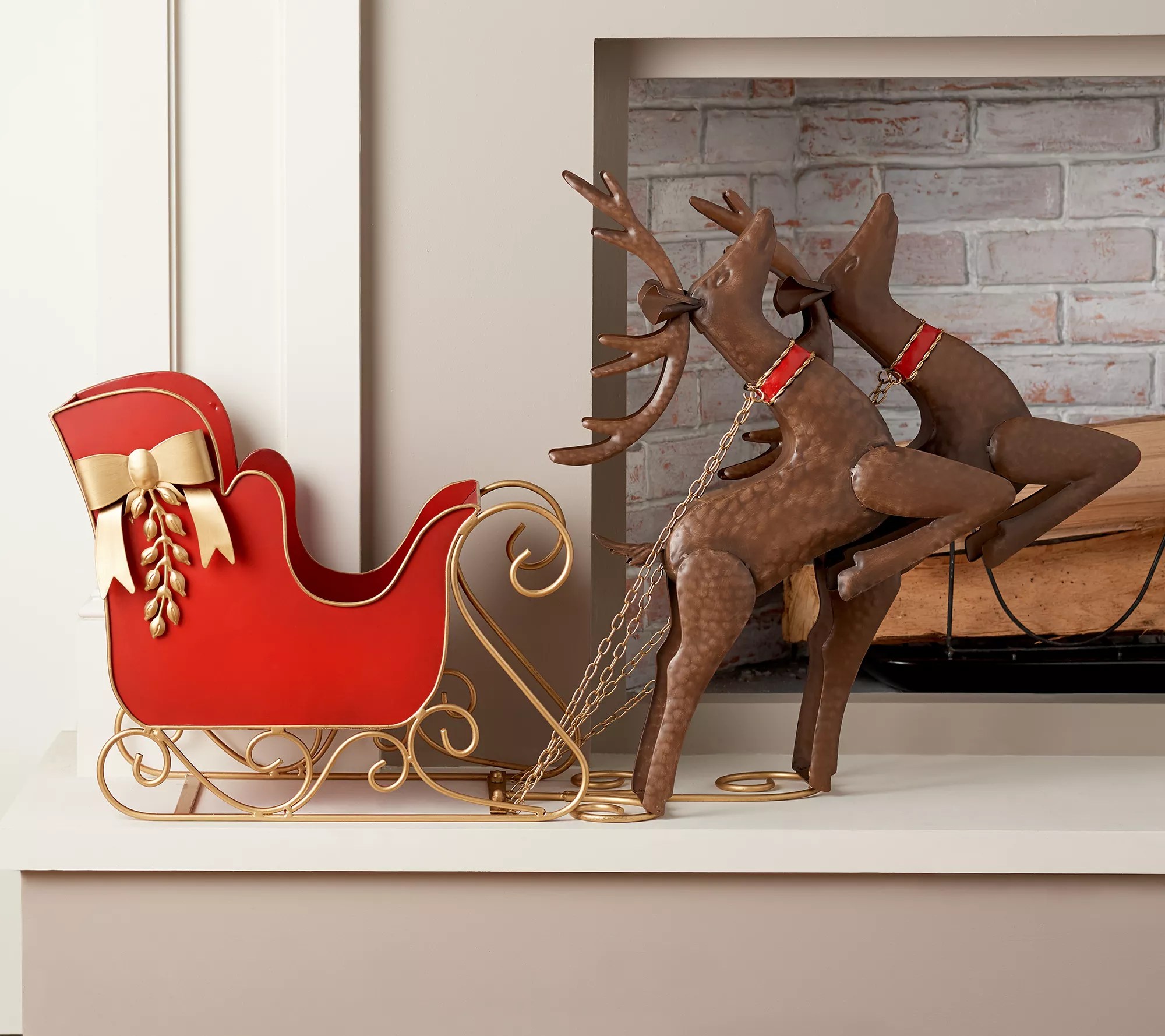 Oversized Metal Sleigh with Reindeer in Flight by Valerie