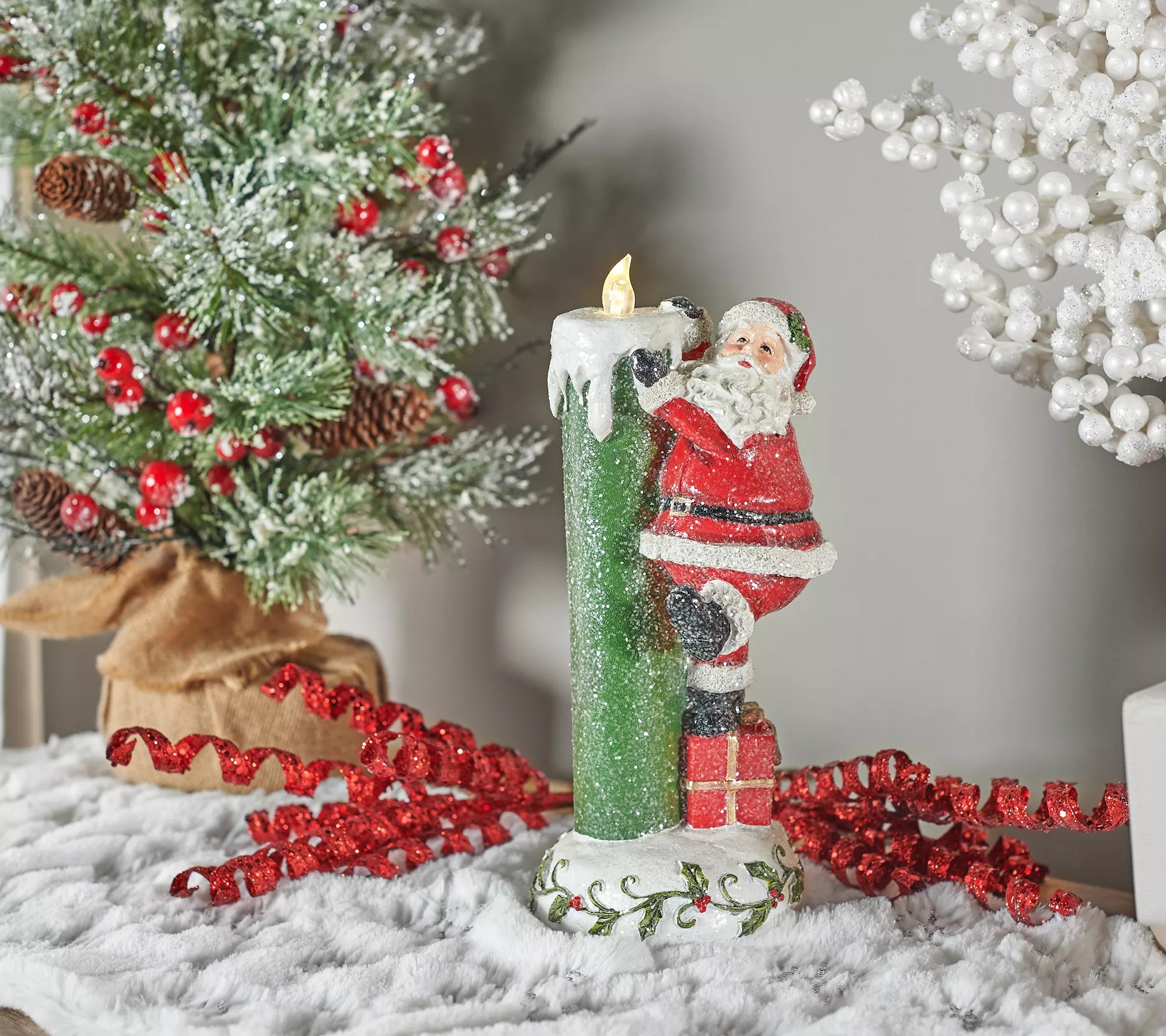 Holiday Figurine with Illuminated Candle by Valerie