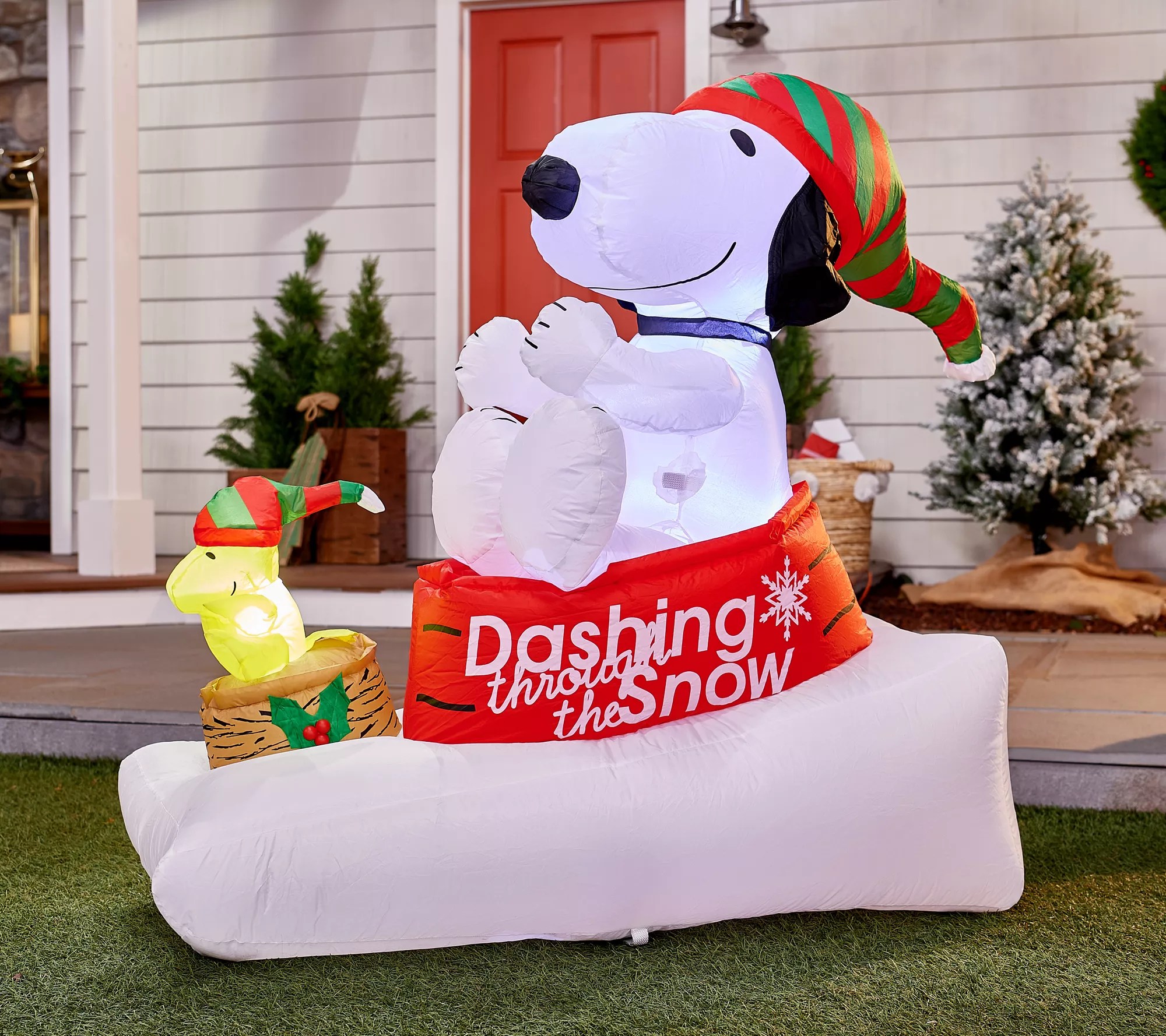 Snoopy and Woodstock Riding in Sled Holiday Inflatable