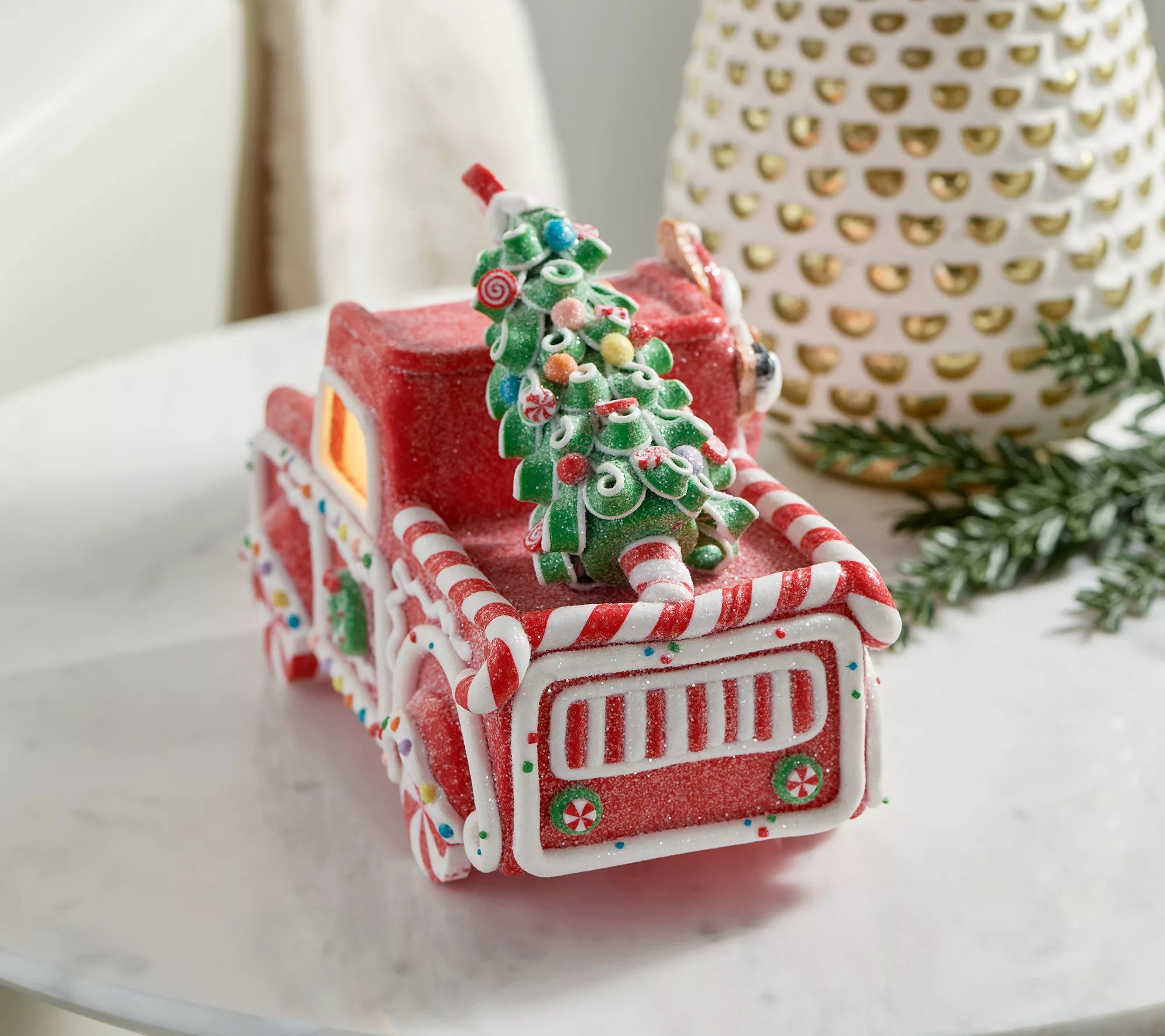 Illuminated Red Gingerbread Truck with Santa by Valerie