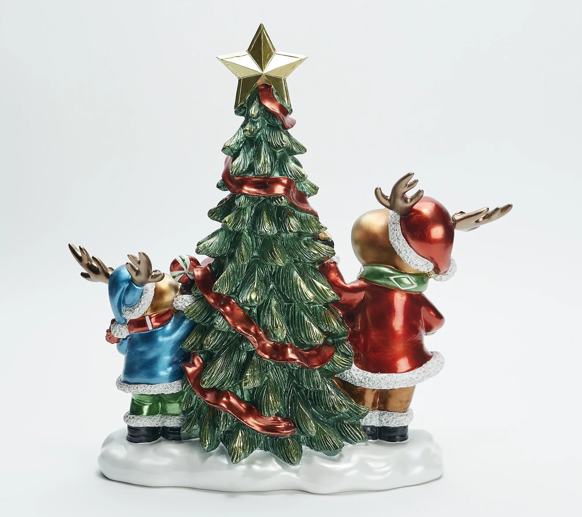Kringle Express Lit Resin Characters Decorating a Christmas Tree
