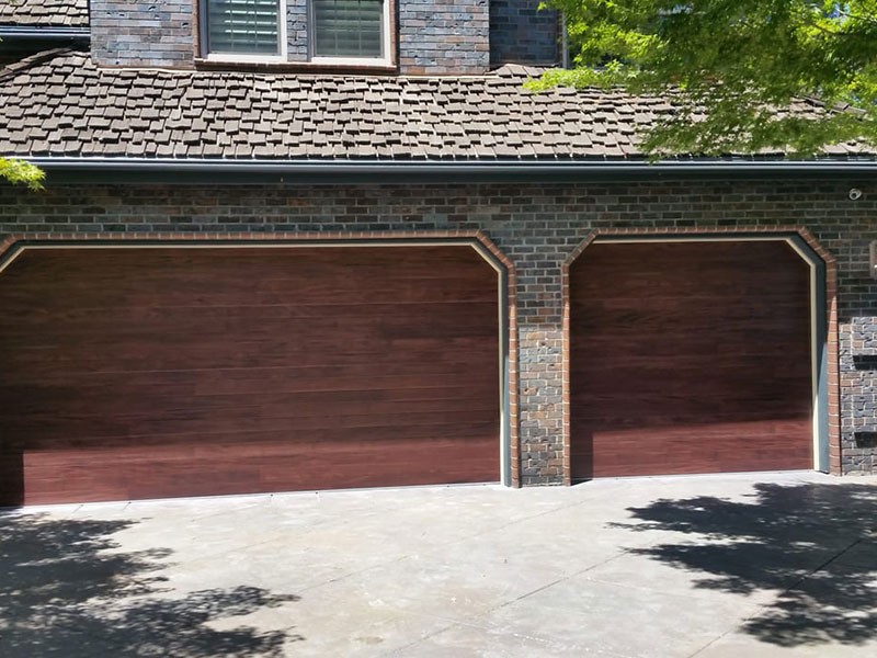 Manual vs Electric Garage Doors The Pros and Cons Manual vs Electric Garage Doors The Pros and Cons