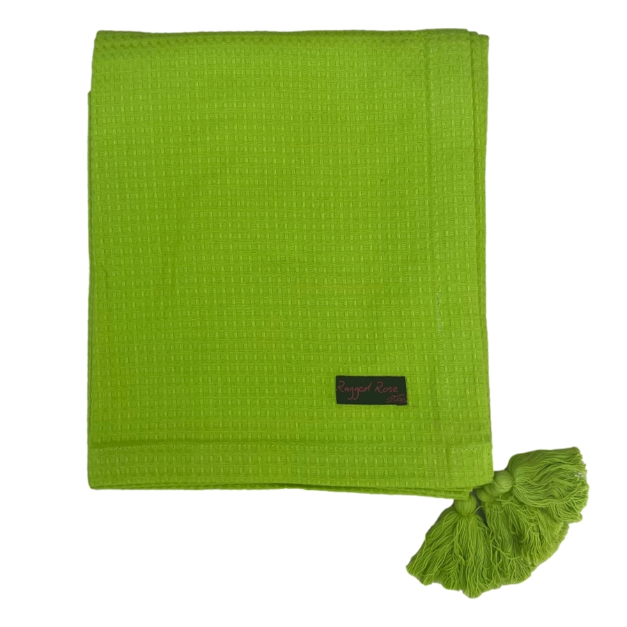 Lime green waffle throw with chunky tassles by Ragged Rose