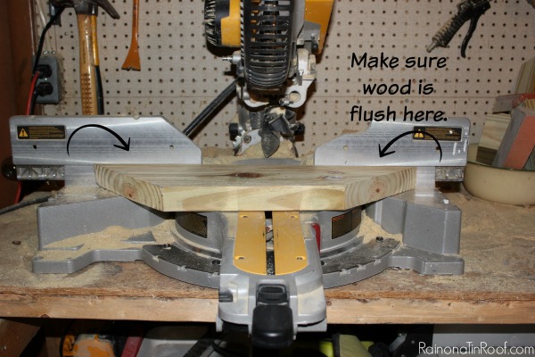 Cutting wood with a power miter saw - Rain on a Tin Roof