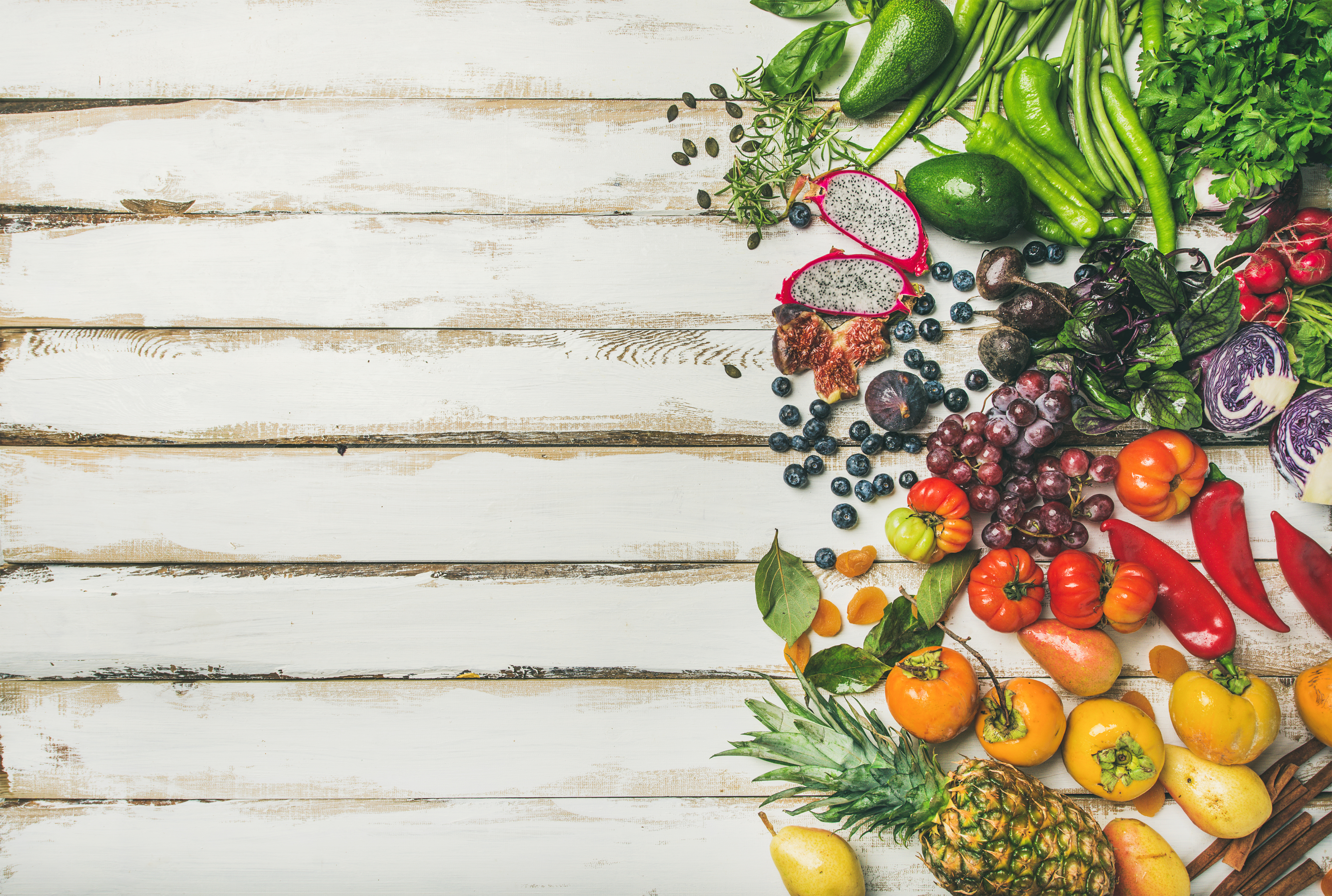 Helathy raw vegan food cooking background over white table RALPH