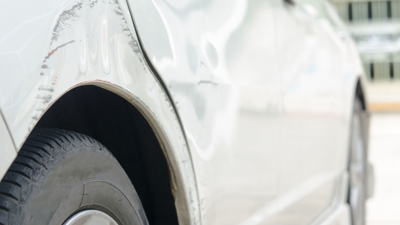 What is Better for Car Door Damage Repair or Replace?