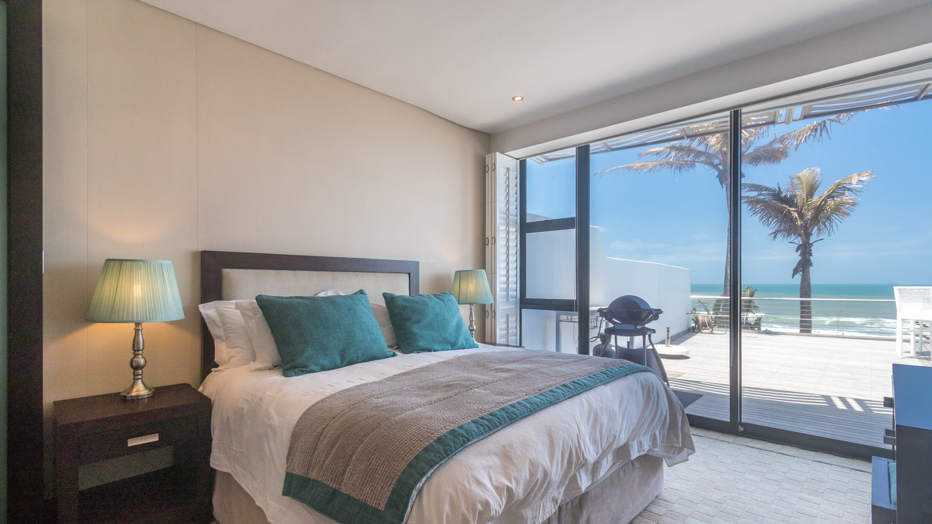 Touching the sand in one of the most exclusive beachfront positions on